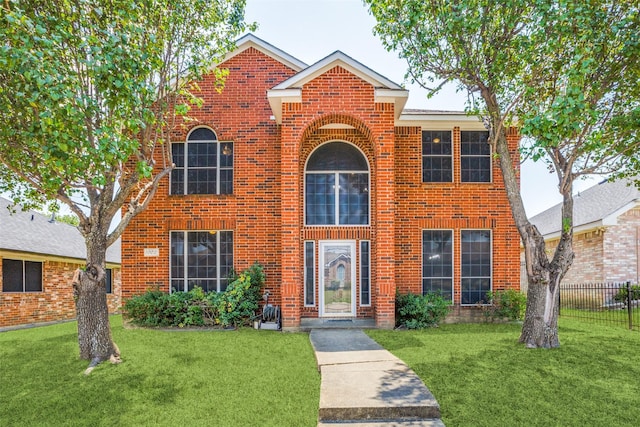 front of property featuring a front lawn