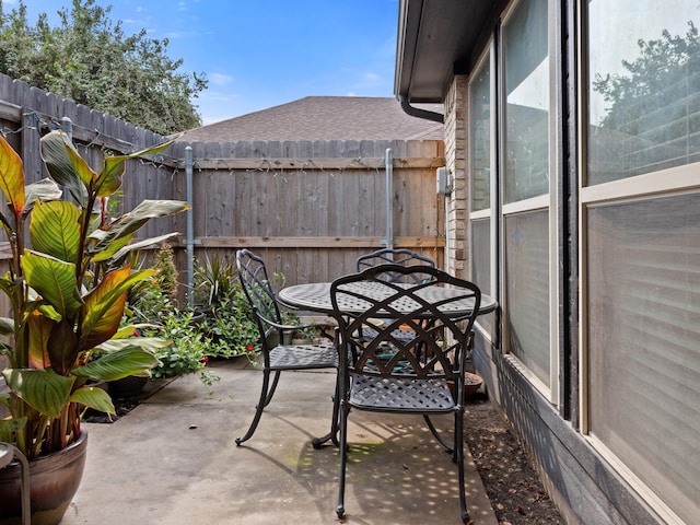 view of patio with fence