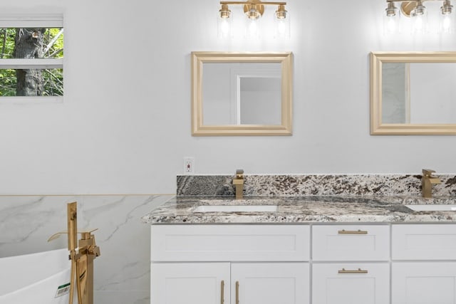 bathroom featuring double vanity