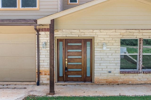 property entrance featuring a garage