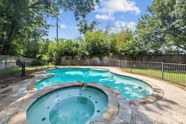 view of pool featuring an in ground hot tub