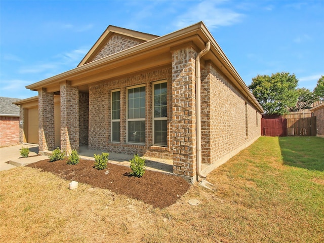 exterior space featuring a front lawn