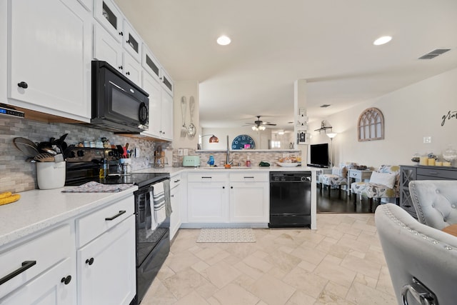 kitchen featuring white cabinets, black appliances, ceiling fan, and tasteful backsplash