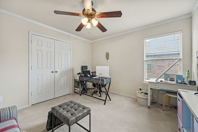 office featuring ceiling fan, light carpet, and ornamental molding