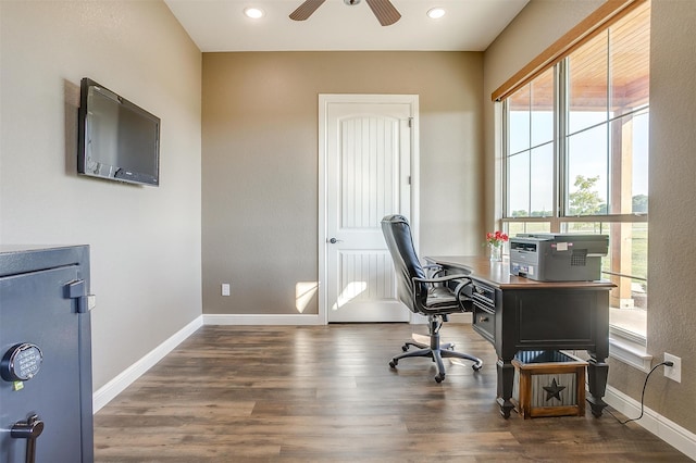 office space featuring ceiling fan, dark hardwood / wood-style flooring, and a healthy amount of sunlight