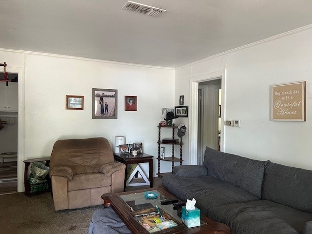 carpeted living room with crown molding