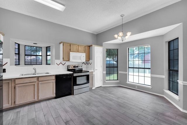 kitchen with white microwave, a sink, stainless steel range with electric cooktop, dishwasher, and light brown cabinetry