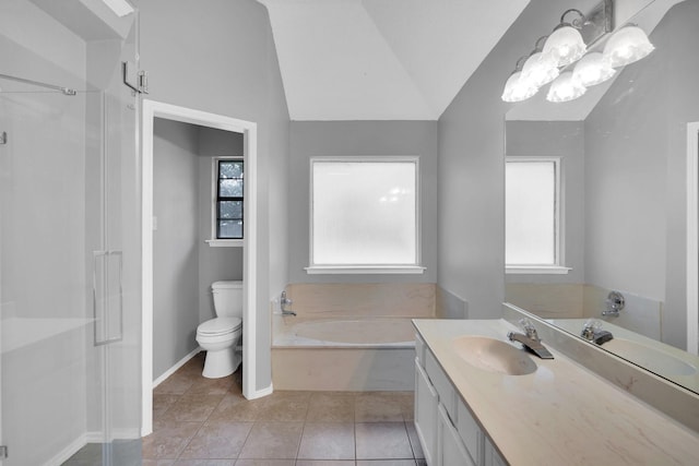 full bath with lofted ceiling, tile patterned flooring, toilet, vanity, and a shower stall