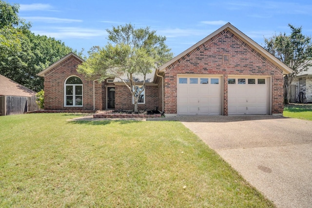 front facade featuring a garage and a front lawn