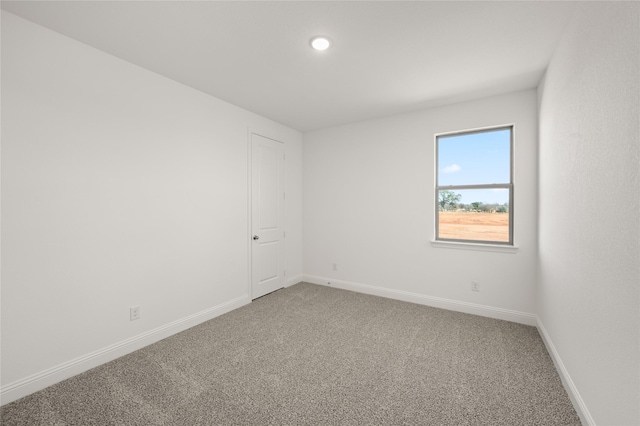 spare room with carpet flooring