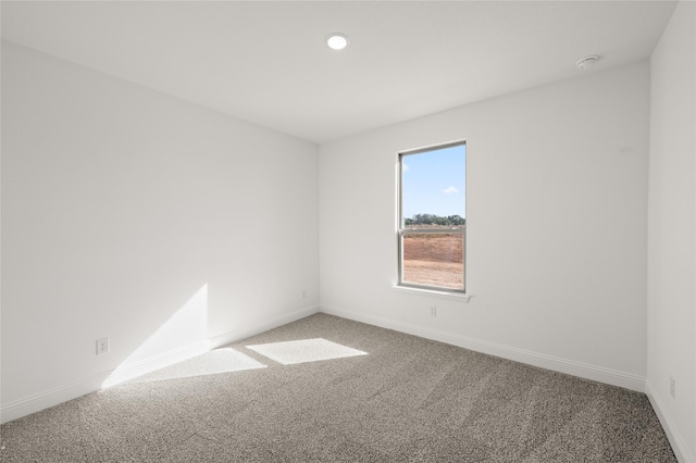 empty room featuring carpet