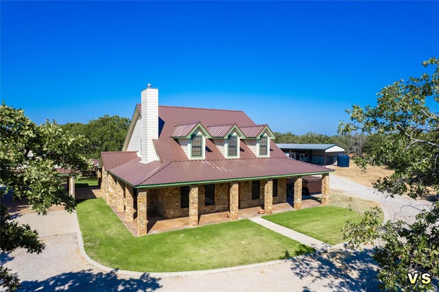 view of front of house featuring a front yard