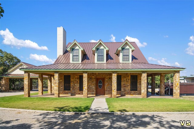 view of front of house featuring a front yard and covered porch