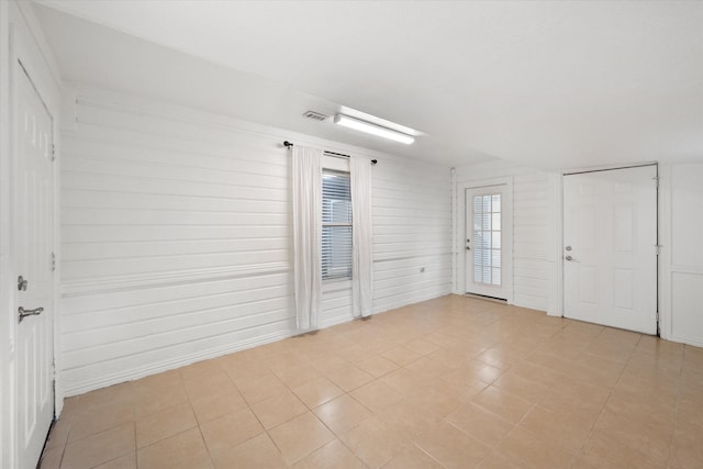 view of tiled foyer entrance