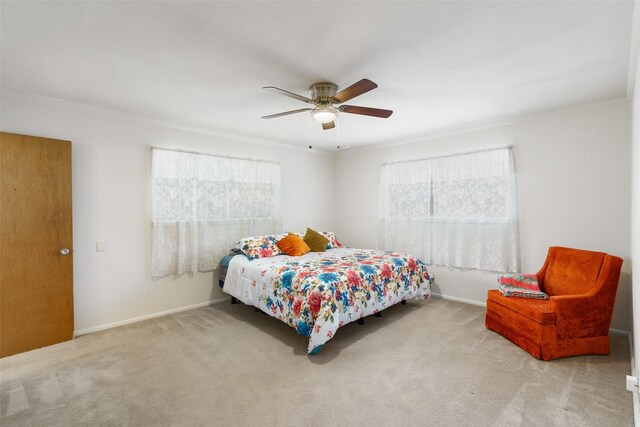 carpeted bedroom with crown molding