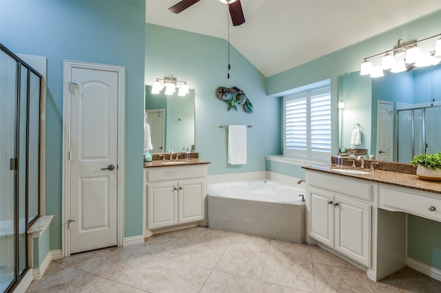 bathroom with ceiling fan, tile patterned floors, vanity, and vaulted ceiling