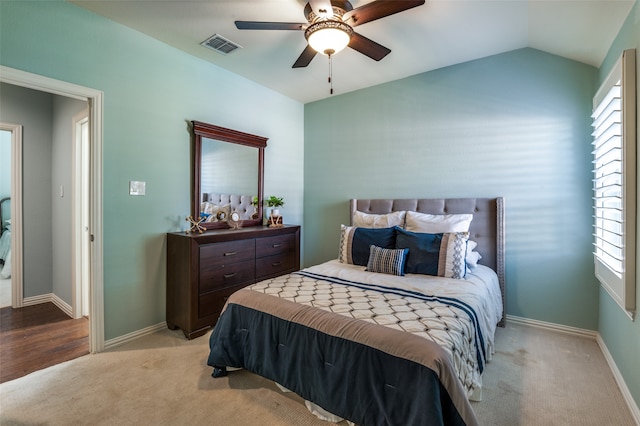 bedroom with ceiling fan, light wood-type flooring, and multiple windows