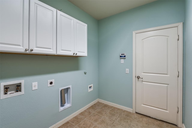 laundry area with washer hookup, cabinet space, hookup for an electric dryer, gas dryer hookup, and baseboards