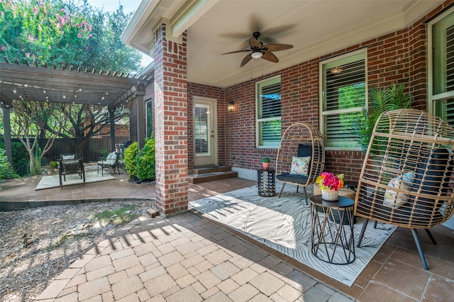 view of patio featuring ceiling fan and a pergola