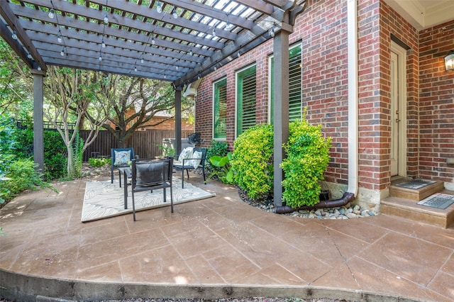 view of patio with fence, a pergola, and outdoor dining space