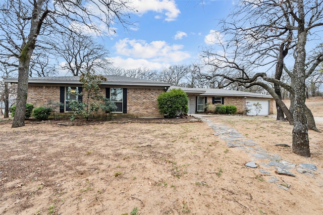 single story home featuring a garage