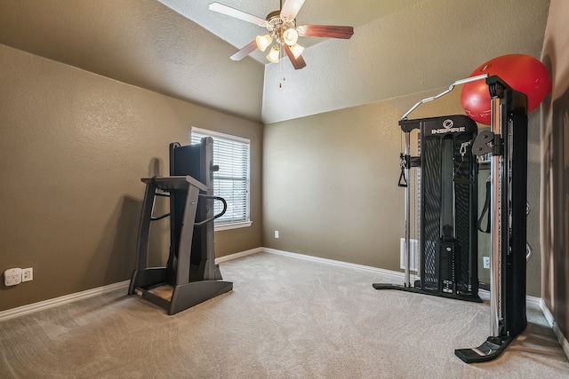 workout area with ceiling fan, a textured ceiling, carpet, and lofted ceiling