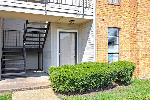 doorway to property with a balcony