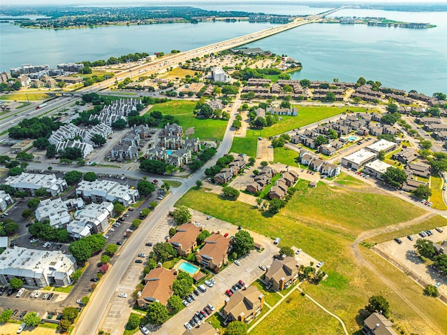 bird's eye view featuring a residential view and a water view