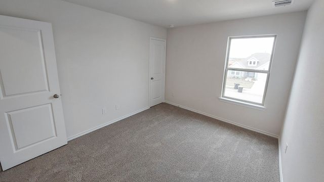 spare room with carpet