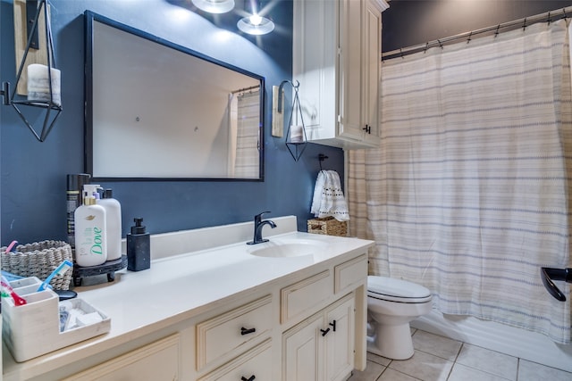 full bathroom featuring shower / bathtub combination with curtain, tile patterned flooring, vanity, and toilet