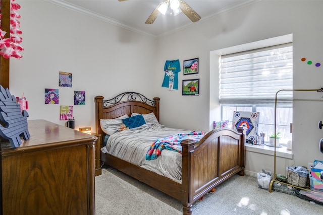 bedroom with light colored carpet, ceiling fan, and ornamental molding