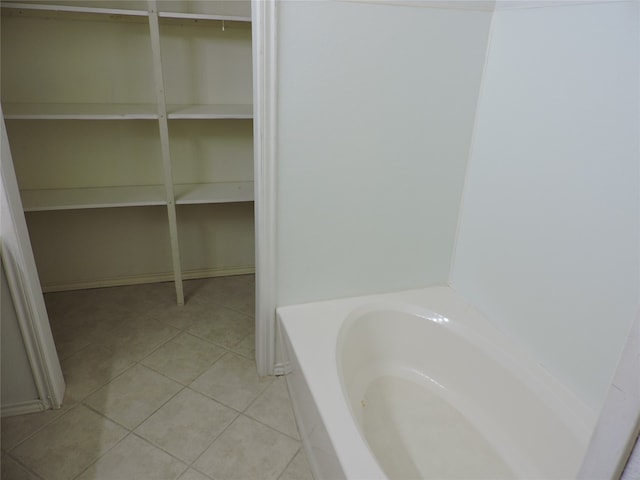 bathroom with tile patterned flooring