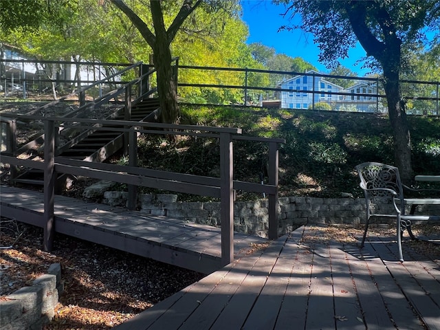 exterior space with stairs and a wooden deck