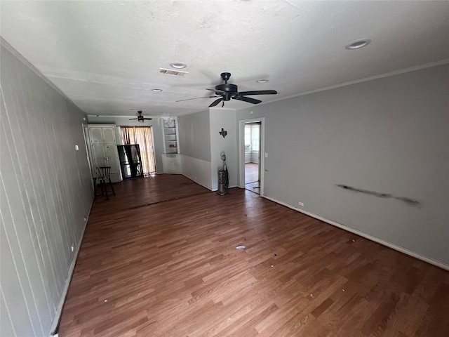 unfurnished living room with ceiling fan and light wood-type flooring