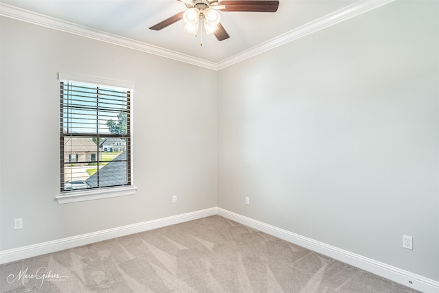 unfurnished room with light carpet, ornamental molding, and ceiling fan