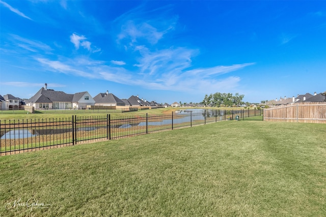 view of yard with a water view