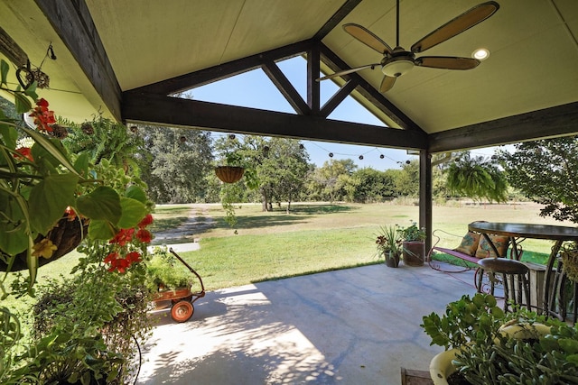 view of patio featuring ceiling fan