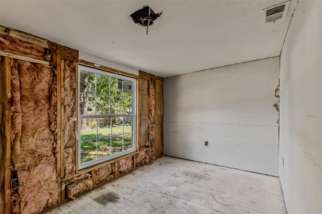 spare room featuring a wealth of natural light