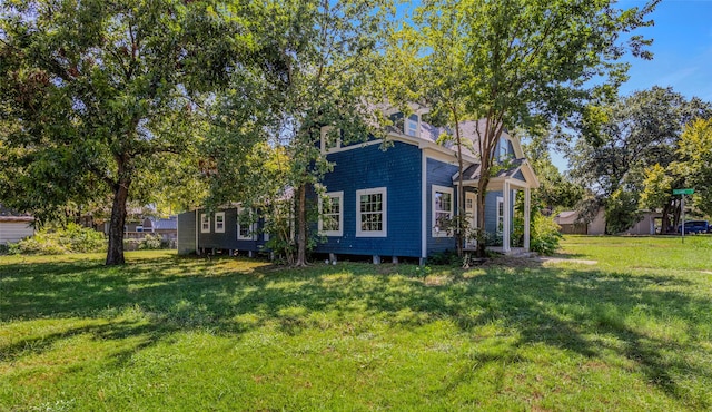 exterior space with a front yard