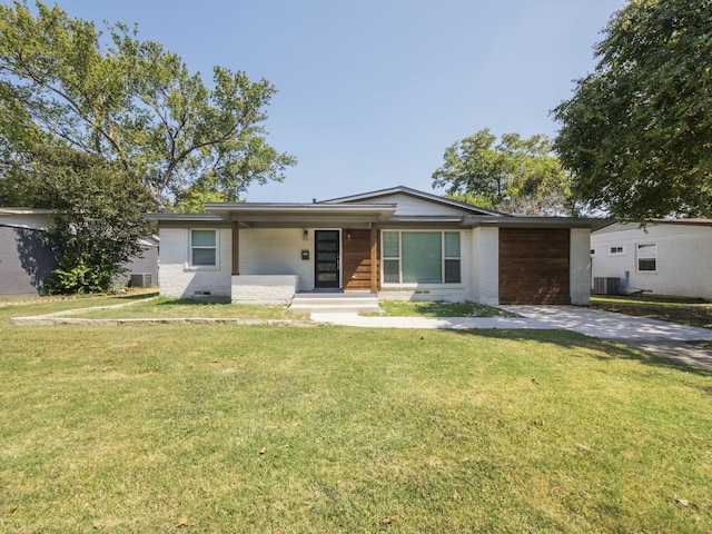 ranch-style house with a porch, central AC, and a front lawn