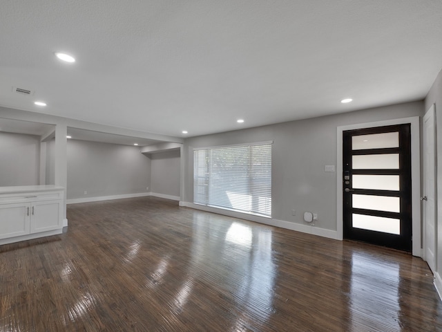 interior space with dark wood-type flooring