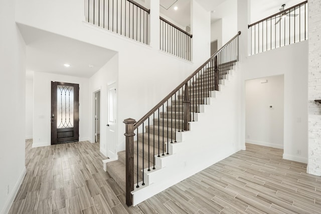 entryway featuring a high ceiling