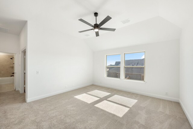 bonus room with lofted ceiling, light carpet, and ceiling fan