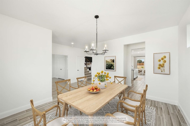 dining room with a chandelier