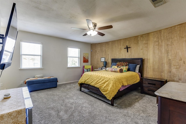 326 E Westview Ter, Arlington, TX 76013 - bedroom featuring wooden walls, carpet flooring, and a ceiling fan