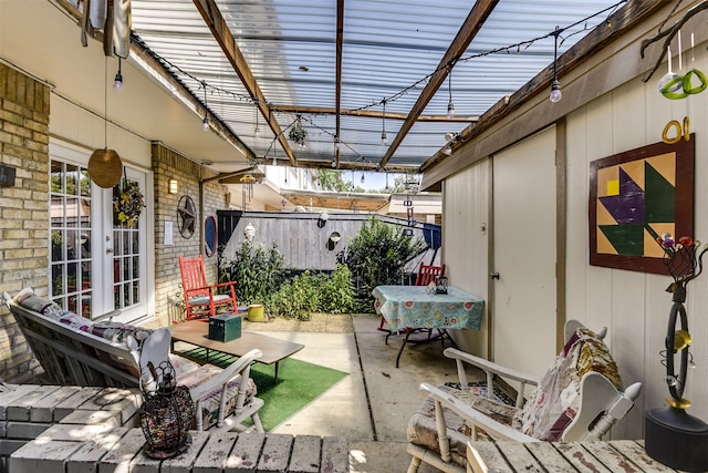 view of patio / terrace with a pergola and french doors