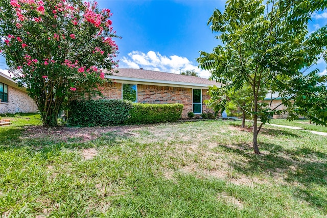 exterior space with a front lawn