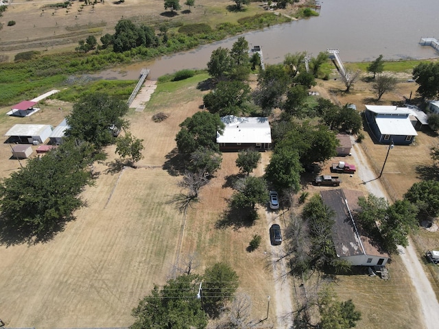 bird's eye view with a water view and a rural view