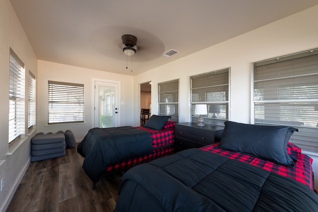 bedroom with ceiling fan and hardwood / wood-style flooring