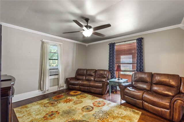 living room featuring ceiling fan, dark hardwood / wood-style floors, and crown molding